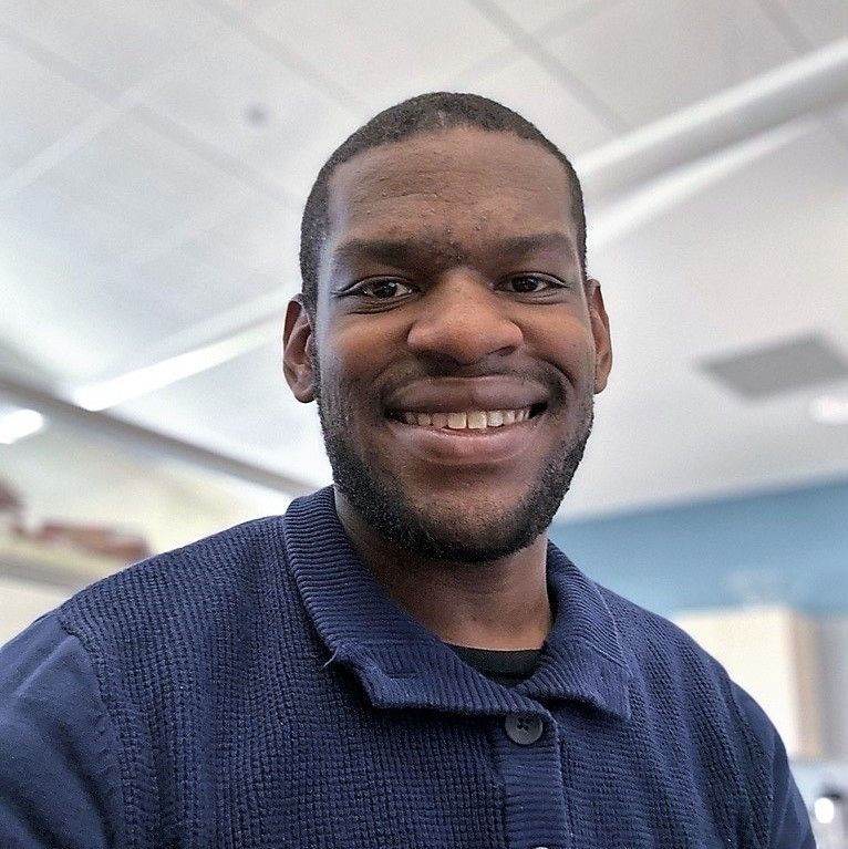 Portrait of Kyran Guess, Board President & Executive Director at SmallSpark